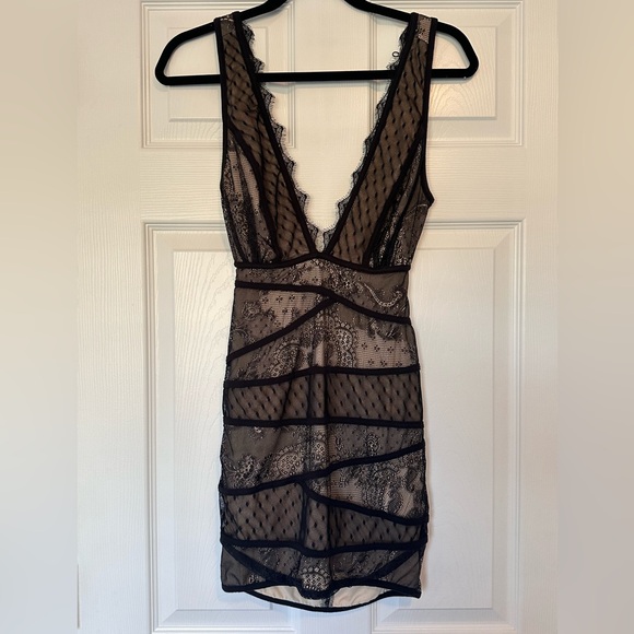 bebe Dresses & Skirts - bebe Black Sheer Lace Plunge Mini Dress